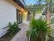 Beautiful home entrance with lush greenery and decorative plants at 1905 Plaza Del Padre, Las Vegas, NV 89102