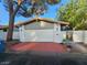 Charming single-story home featuring a brick driveway and a well-maintained front yard at 1905 Plaza Del Padre, Las Vegas, NV 89102