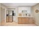 Bright kitchen features stainless steel appliances and modern two-tone cabinetry at 1905 Plaza Del Padre, Las Vegas, NV 89102
