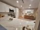 Bright kitchen features quartz countertops, stainless steel appliances, and ample cabinet space at 1905 Plaza Del Padre, Las Vegas, NV 89102
