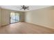 Bright bedroom with sliding glass door for backyard access at 1905 Plaza Del Padre, Las Vegas, NV 89102