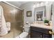 Cozy bathroom featuring a glass-enclosed shower, modern fixtures, and neutral decor at 2042 Maple Springs St, Henderson, NV 89002