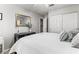 Cozy bedroom featuring neutral tones, a ceiling fan, and a large window at 2042 Maple Springs St, Henderson, NV 89002