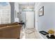 Bright foyer with tiled floors, fresh paint, and decorative lighting at 2042 Maple Springs St, Henderson, NV 89002