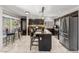 Well-equipped kitchen featuring an island, stainless steel appliances, and stylish bar seating at 2042 Maple Springs St, Henderson, NV 89002