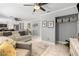Cozy Gathering room with a ceiling fan, neutral-toned furniture, and an open layout at 2042 Maple Springs St, Henderson, NV 89002