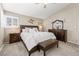 Spacious main bedroom with a ceiling fan, ample natural light, and neutral tones at 2042 Maple Springs St, Henderson, NV 89002