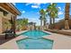 Swimming pool with mature landscaping and a private jacuzzi at 2042 Maple Springs St, Henderson, NV 89002
