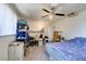Bedroom with carpet floors, a ceiling fan, built-in closet, and ample space at 225 Pecos Way, Las Vegas, NV 89121