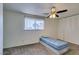 Bedroom features closet and window to the outside at 225 Pecos Way, Las Vegas, NV 89121