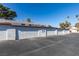 Row of garages with classic panel design offers convenient parking for residents at 225 Pecos Way, Las Vegas, NV 89121