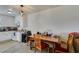 Bright eat-in kitchen featuring an dining table and white appliances at 225 Pecos Way, Las Vegas, NV 89121