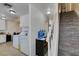 Washer and dryer near carpeted staircase at 225 Pecos Way, Las Vegas, NV 89121