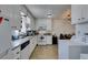 Washer and dryer connected to kitchen with dining area at 225 Pecos Way, Las Vegas, NV 89121