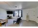 Spacious living room features light wood-look floors, neutral walls, and plenty of natural light at 225 Pecos Way, Las Vegas, NV 89121