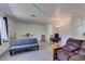 Comfortable living room with light-colored wood flooring and neutral-colored walls at 225 Pecos Way, Las Vegas, NV 89121