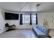 Sunlit living room boasts wood-look floors, neutral walls, and windows offering serene views at 225 Pecos Way, Las Vegas, NV 89121