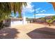 Open backyard space with desert landscaping and views, perfect for outdoor activities and relaxing at 2749 Del Mar Pl, Las Vegas, NV 89169