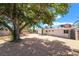 Large backyard with mature trees and a low-maintenance rockscape at 2749 Del Mar Pl, Las Vegas, NV 89169
