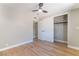 Bedroom with hardwood floors, closet, ceiling fan in a neutral decor at 2749 Del Mar Pl, Las Vegas, NV 89169