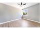 Neutral bedroom featuring hardwood floors, large window with an outside view at 2749 Del Mar Pl, Las Vegas, NV 89169