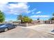 Single-story home boasts a large driveway, desert landscaping, and an attached carport for convenient parking at 2749 Del Mar Pl, Las Vegas, NV 89169