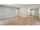 Bright living room features light wood floors that leads into the kitchen area at 2749 Del Mar Pl, Las Vegas, NV 89169
