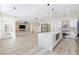 Bright and open-concept living area connected to the kitchen with lots of natural light and modern decor at 2755 Darby Falls Dr, Las Vegas, NV 89134