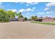 Expansive backyard with ample space, a small structure, and partial landscaping offering many outdoor possibilities at 2821 Moon Cir, Las Vegas, NV 89120