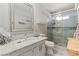 Bright bathroom with walk-in shower, granite countertops, and modern fixtures at 2821 Moon Cir, Las Vegas, NV 89120