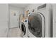This laundry room is equipped with modern washer and dryer units for efficient and convenient clothes care at 2821 Moon Cir, Las Vegas, NV 89120
