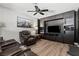 Stylish living room includes a large entertainment center with TV and shelving at 2821 Moon Cir, Las Vegas, NV 89120