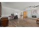 Bright living room showcasing a fireplace, wood-style flooring, and ample space at 2821 Moon Cir, Las Vegas, NV 89120
