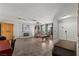 Spacious living room features wood flooring, a fireplace, and large windows at 2821 Moon Cir, Las Vegas, NV 89120