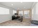 The office space has wood-look flooring, a modern desk setup, and ample lighting for a productive work environment at 2821 Moon Cir, Las Vegas, NV 89120