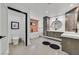 Elegant bathroom with dual vanities, a soaking tub, and modern fixtures at 324 Park Way, Las Vegas, NV 89106