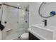 Updated bathroom featuring a glass-enclosed shower and modern fixtures and sink at 324 Park Way, Las Vegas, NV 89106
