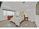 Cozy bedroom featuring natural light, modern decor, and stylish furnishings at 324 Park Way, Las Vegas, NV 89106