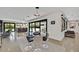 Chic dining area featuring a modern table, stylish chairs, polished concrete floors, and abundant natural light at 324 Park Way, Las Vegas, NV 89106
