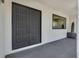 Inviting entrance featuring a stylish double door, a modern window, and sleek tile flooring at 324 Park Way, Las Vegas, NV 89106