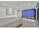 Main bedroom featuring a projector screen and access to a private outdoor space at 324 Park Way, Las Vegas, NV 89106