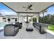 Inviting outdoor lounge area with ample seating and covered patio, perfect for entertaining at 324 Park Way, Las Vegas, NV 89106