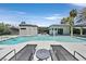 Inviting backyard swimming pool with lounge chairs for relaxing in the sun at 324 Park Way, Las Vegas, NV 89106