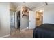 Bedroom with attached bathroom and walk-in closet providing plenty of storage at 327 Fuente Dr, Henderson, NV 89014