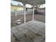 Backyard patio featuring concrete tiles, providing a functional outdoor space for relaxation at 335 W Basic Rd, Henderson, NV 89015