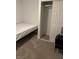 Cozy bedroom featuring neutral walls, plush carpet, a closet, and natural light at 335 W Basic Rd, Henderson, NV 89015