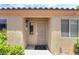 Inviting front entrance featuring a secure white metal security gate and cozy covered porch at 3495 Eagle Bend St, Las Vegas, NV 89122