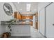 Well-lit kitchen with ample cabinetry, modern appliances, and a skylight providing natural light at 3495 Eagle Bend St, Las Vegas, NV 89122