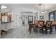 Spacious kitchen with breakfast bar and an open layout that connects seamlessly to the dining and living areas at 3495 Eagle Bend St, Las Vegas, NV 89122