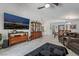 Open-concept living area features tile floors, built-in cabinetry, and ample natural light for a comfortable atmosphere at 3495 Eagle Bend St, Las Vegas, NV 89122